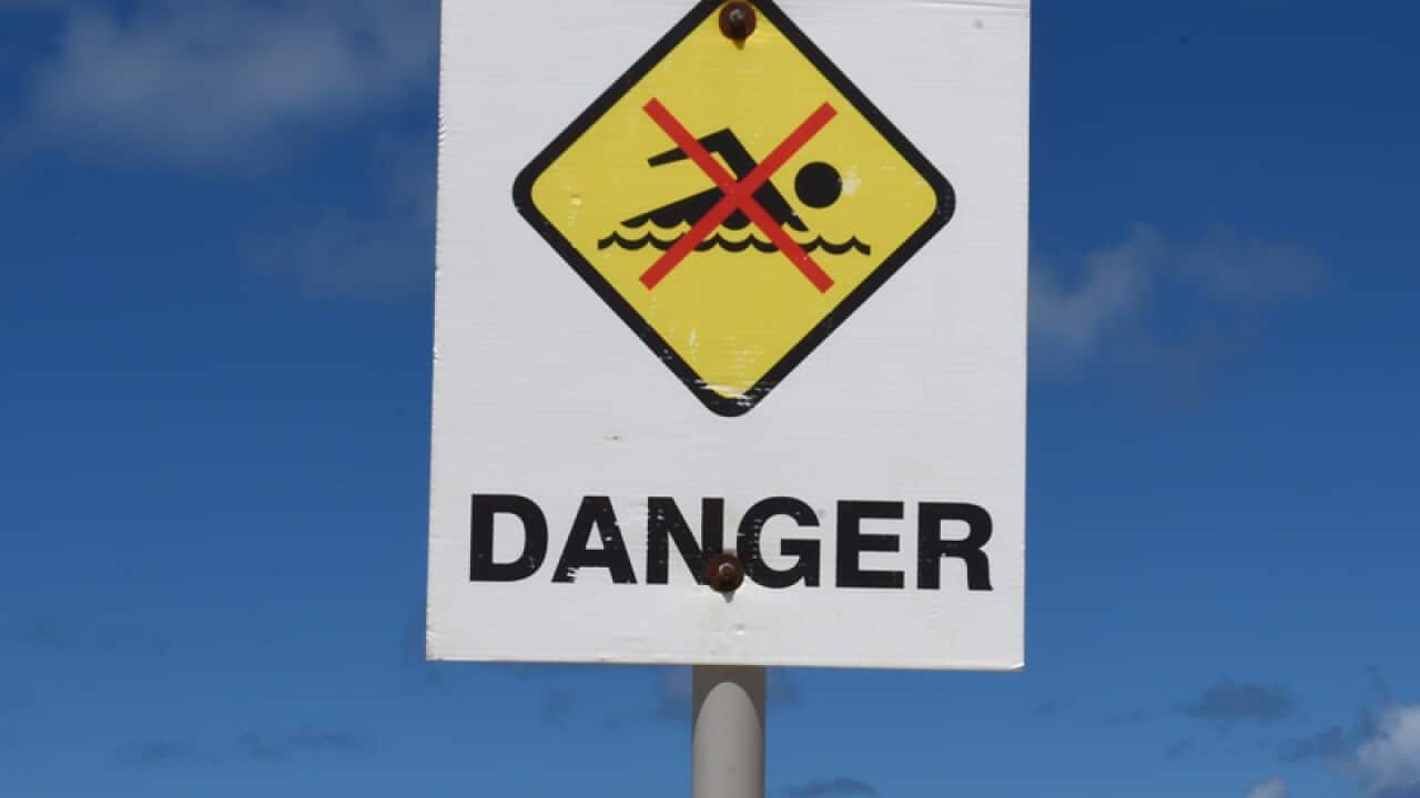 A file photo of a closed beach.
