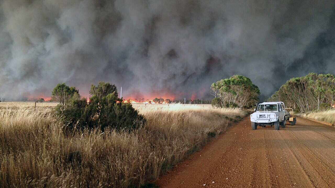 A fire front approaching a property in Scaddan, near Esperance WA