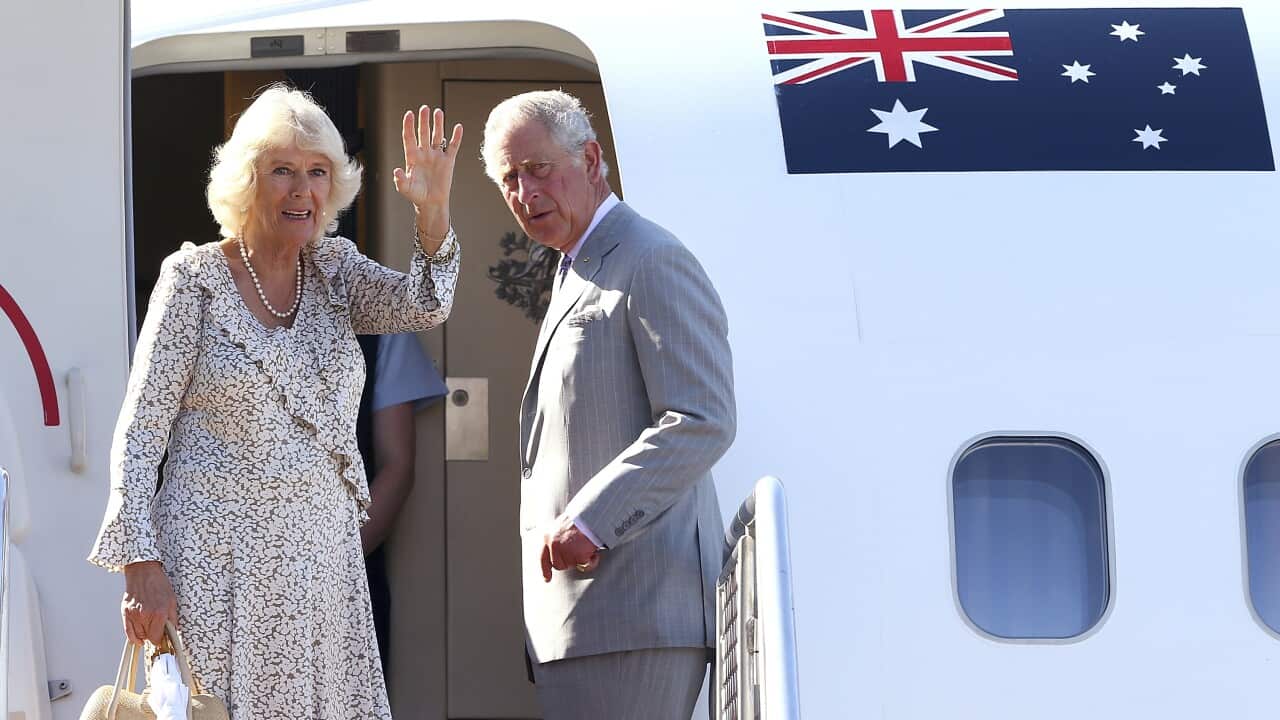 FILE - Britain's Prince Charles, right, and his wife Camilla, Duchess of Cornwall, wave as they prepare to depart Perth, Australia, Sunday, 15 November 2015.