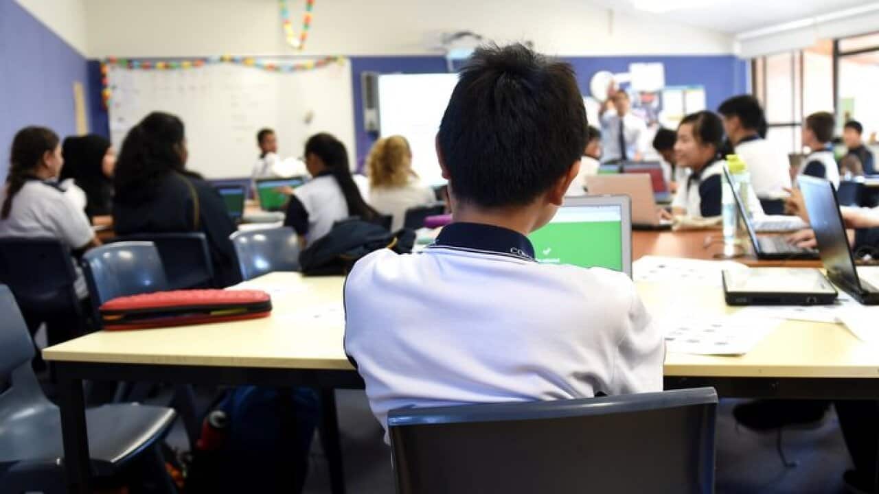 Students attend a class at Alexandria Park Community School