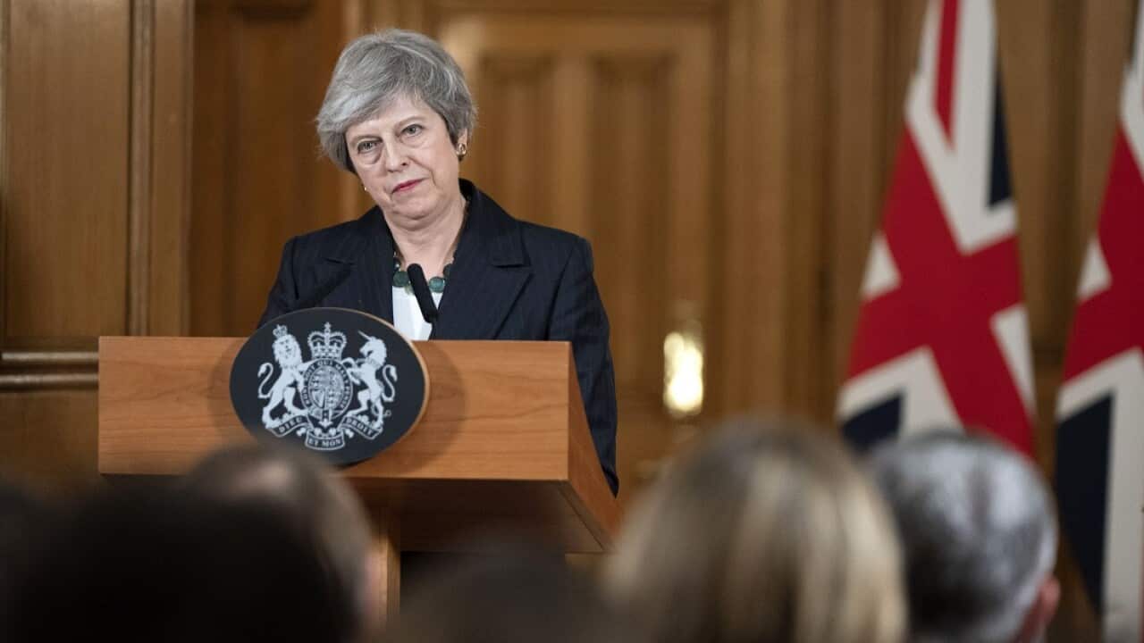 British Prime Minister Theresa May, delivers a statement during a news conference inside number 10 Downing Street in London.