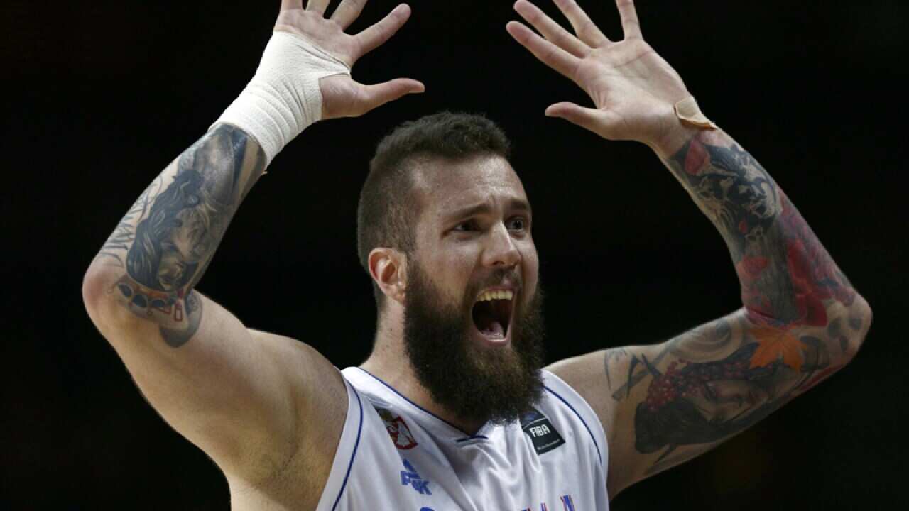 A Serbian player celebrates.