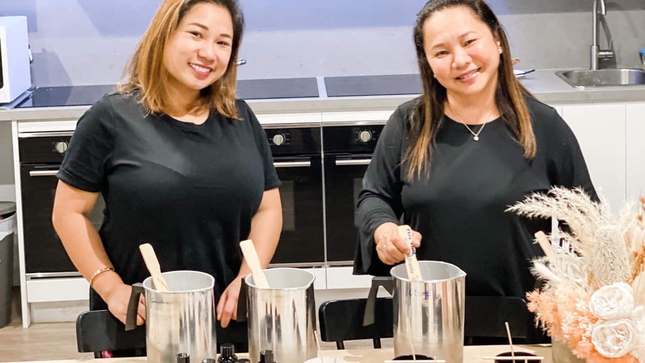 Neighbours turned candle business partners