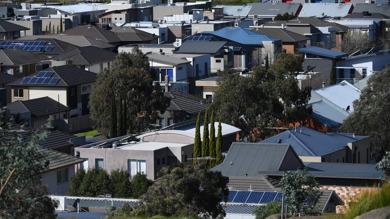 A view of the rooftops of homes.
