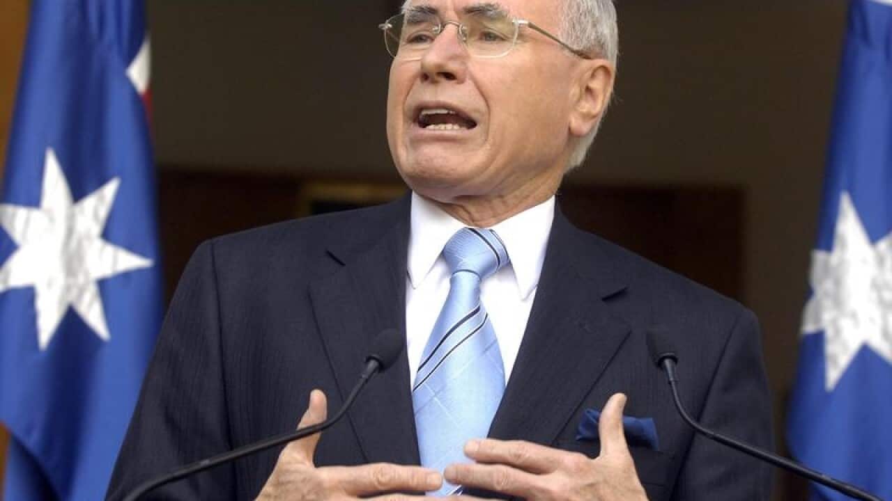 Australian Prime Minister John Howard speaks at a media conference.