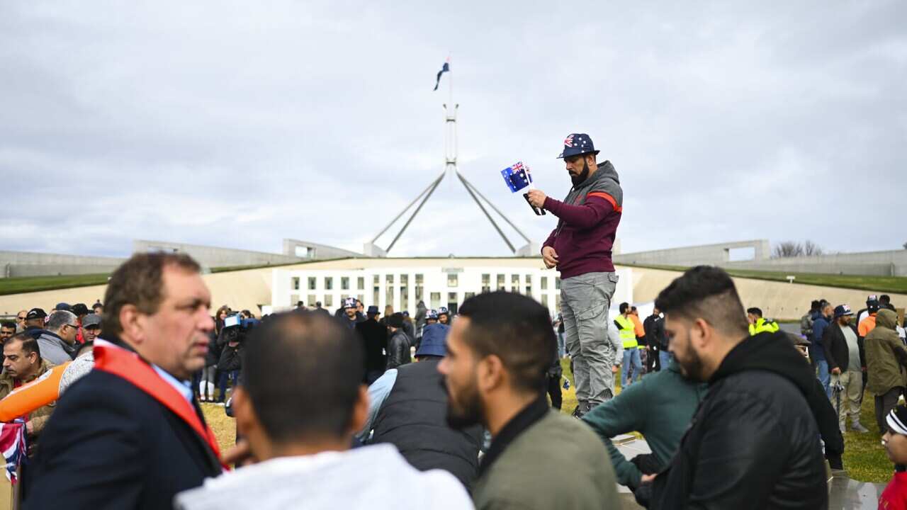 A visa protection protest held at Parliament House (AAP).jpg