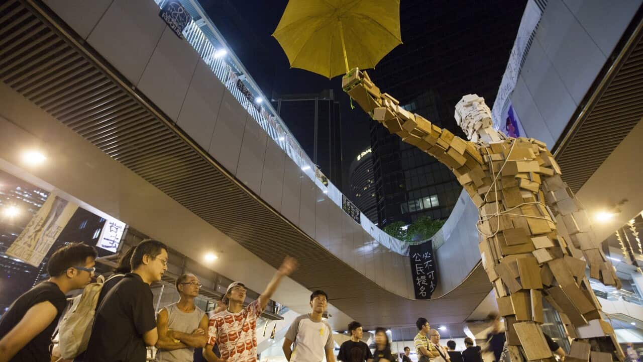umbrella_man_141008_aap.jpg