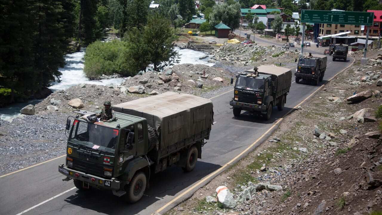 An army convoy moves on the China-India border, north-east of Srinagar, India.