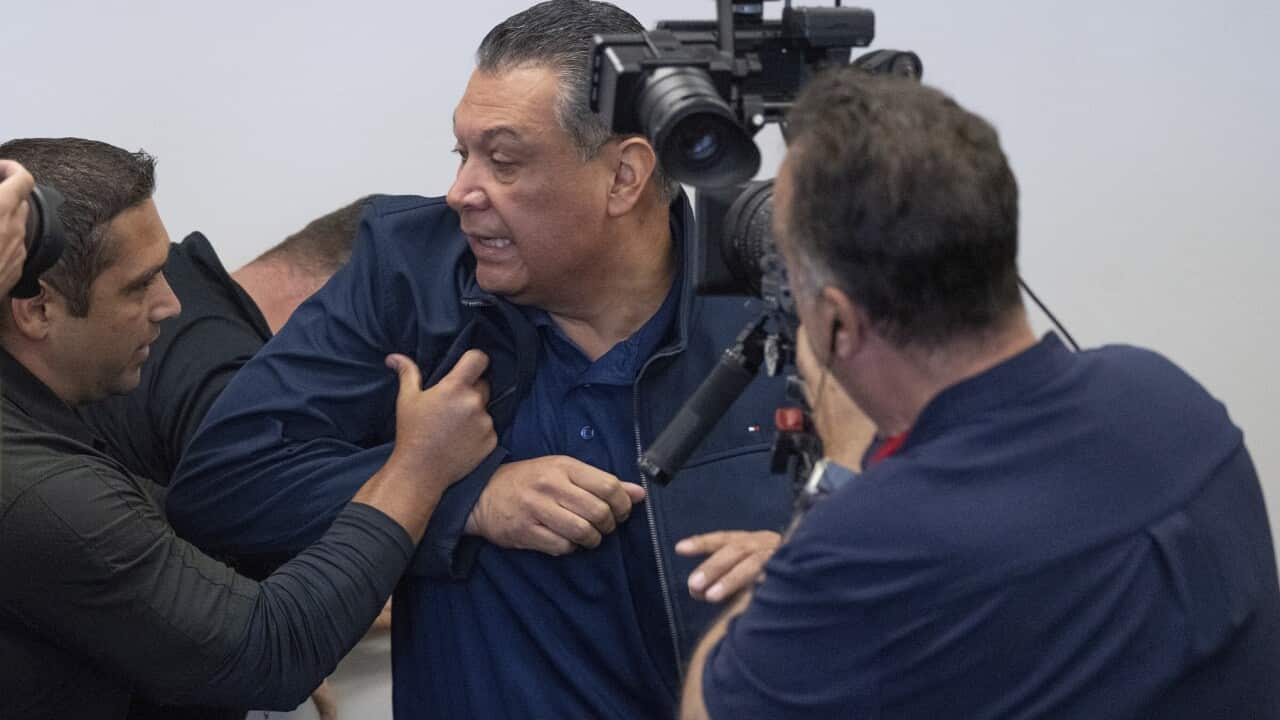 US Senator Alex Padilla is removed from a news conference.