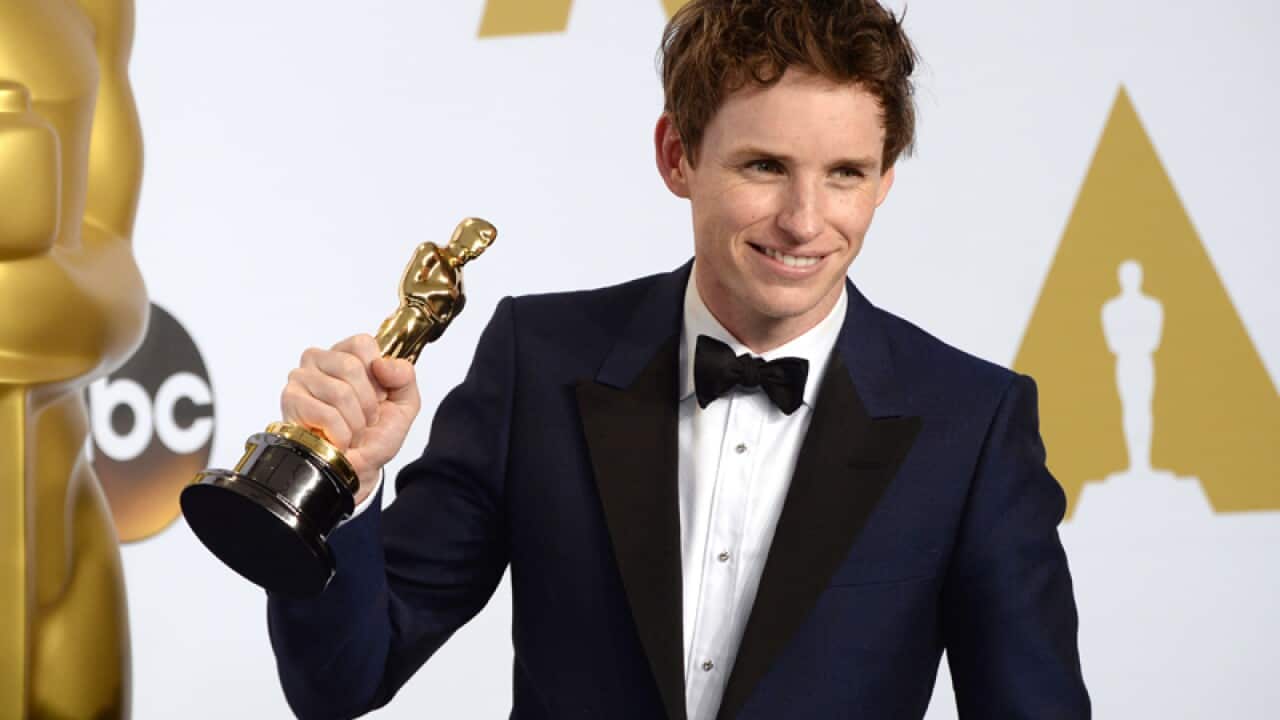Eddie Redmayne with the Actor in a Leading Role Award