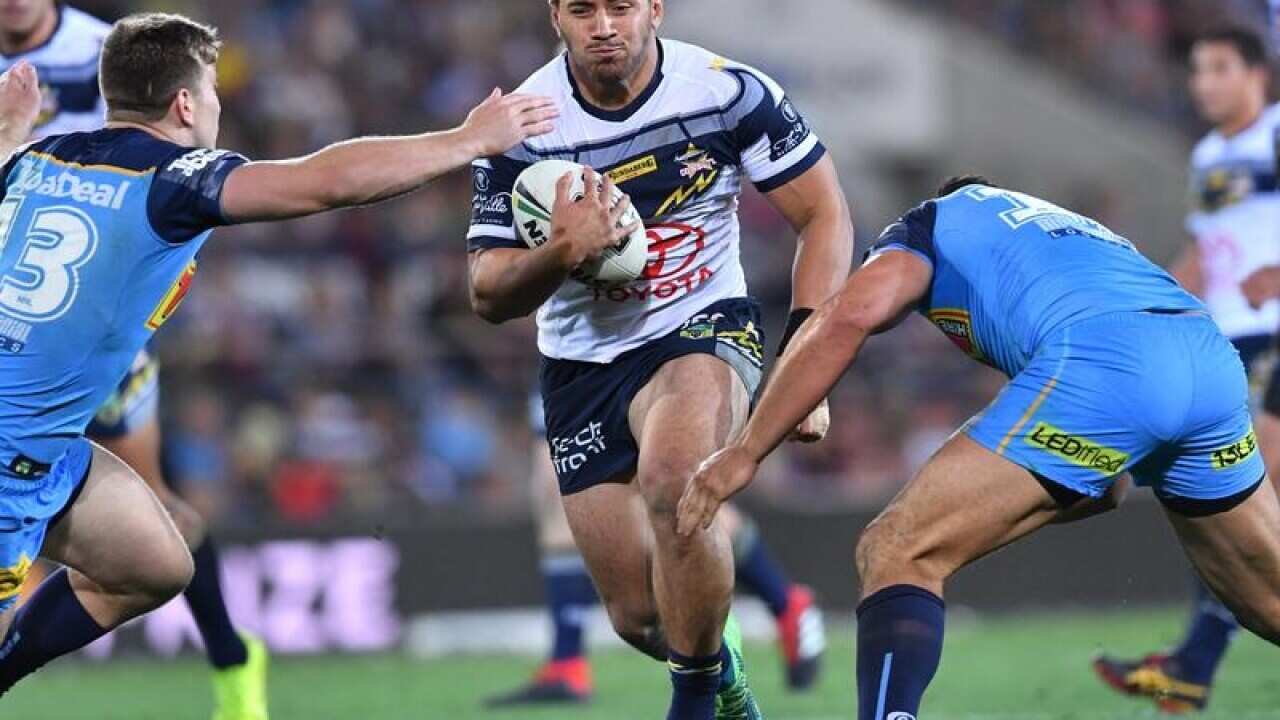 Jason Taumalolo (centre) of the Cowboys