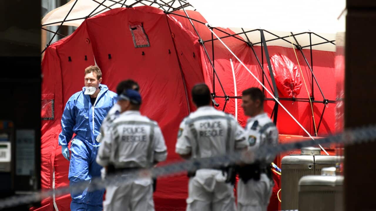 Forensic Services personnel are seen at the Lindt cafe in Sydney