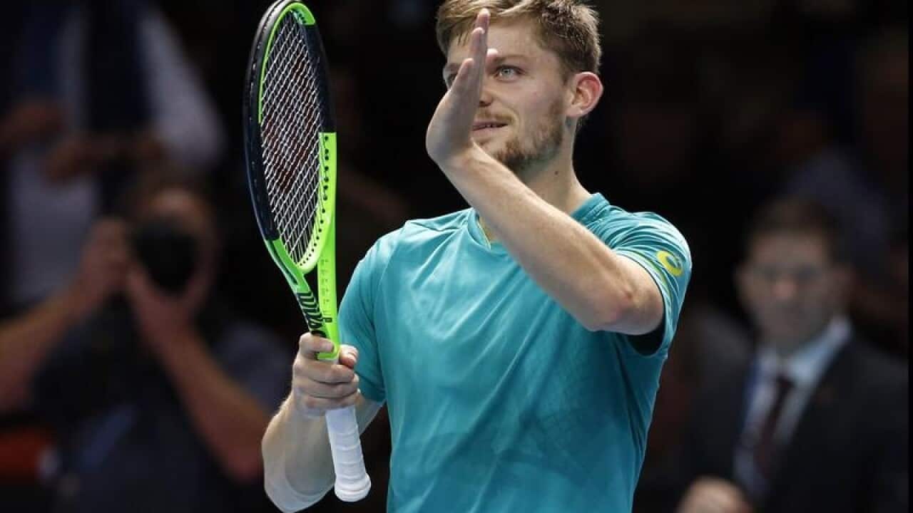 David Goffin celebrates after defeating Dominic Thiem
