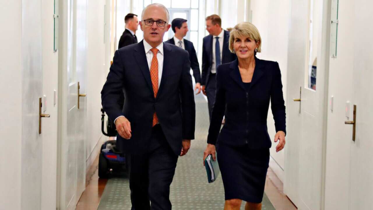 Malcolm Turnbull and Julie Bishop in the corridors of parliament
