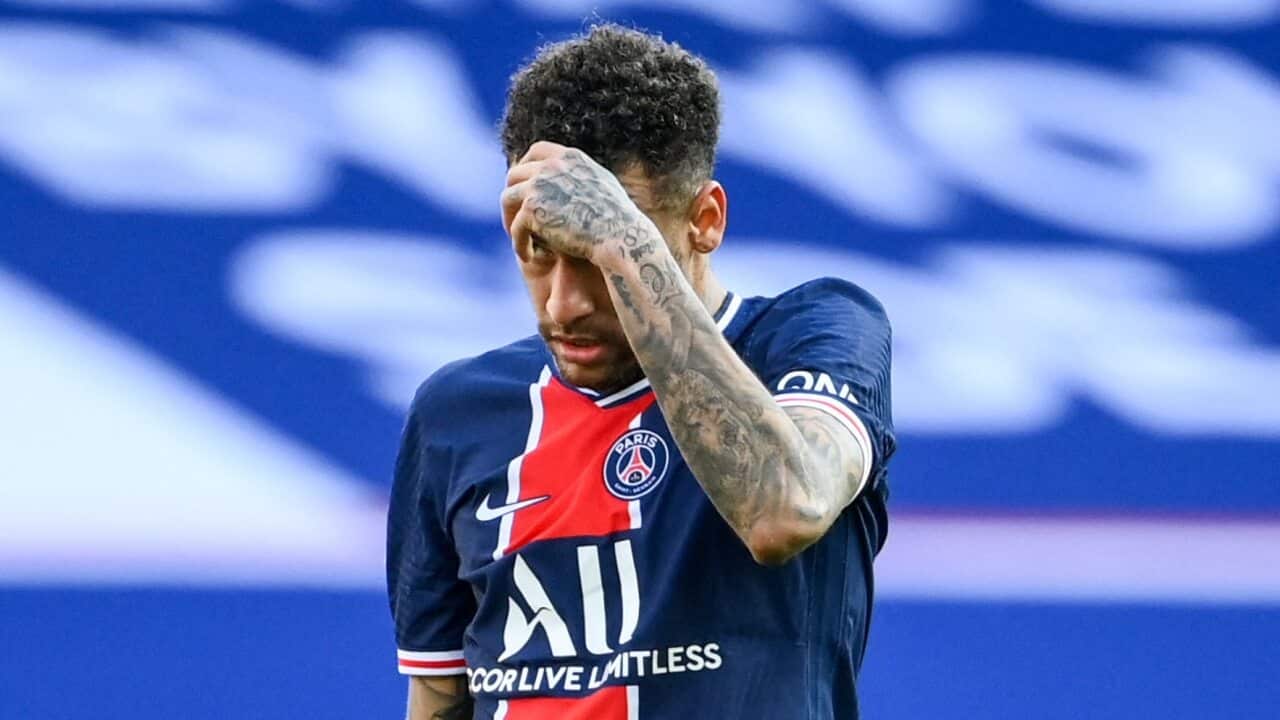 Neymar reacts after receiving a red card for PSG