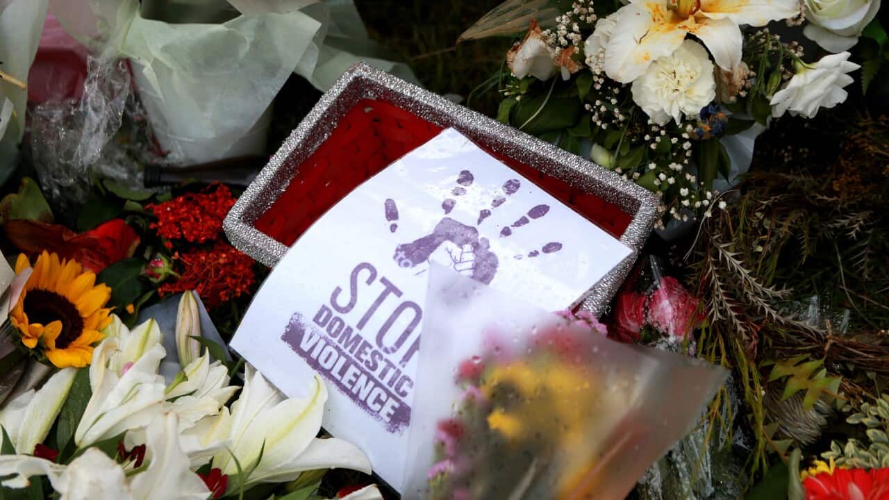 Flowers at a domestic violence vigil