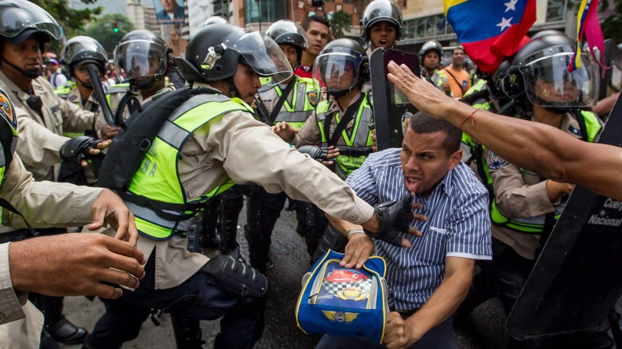 Demonstrators clash with police during a protest 
