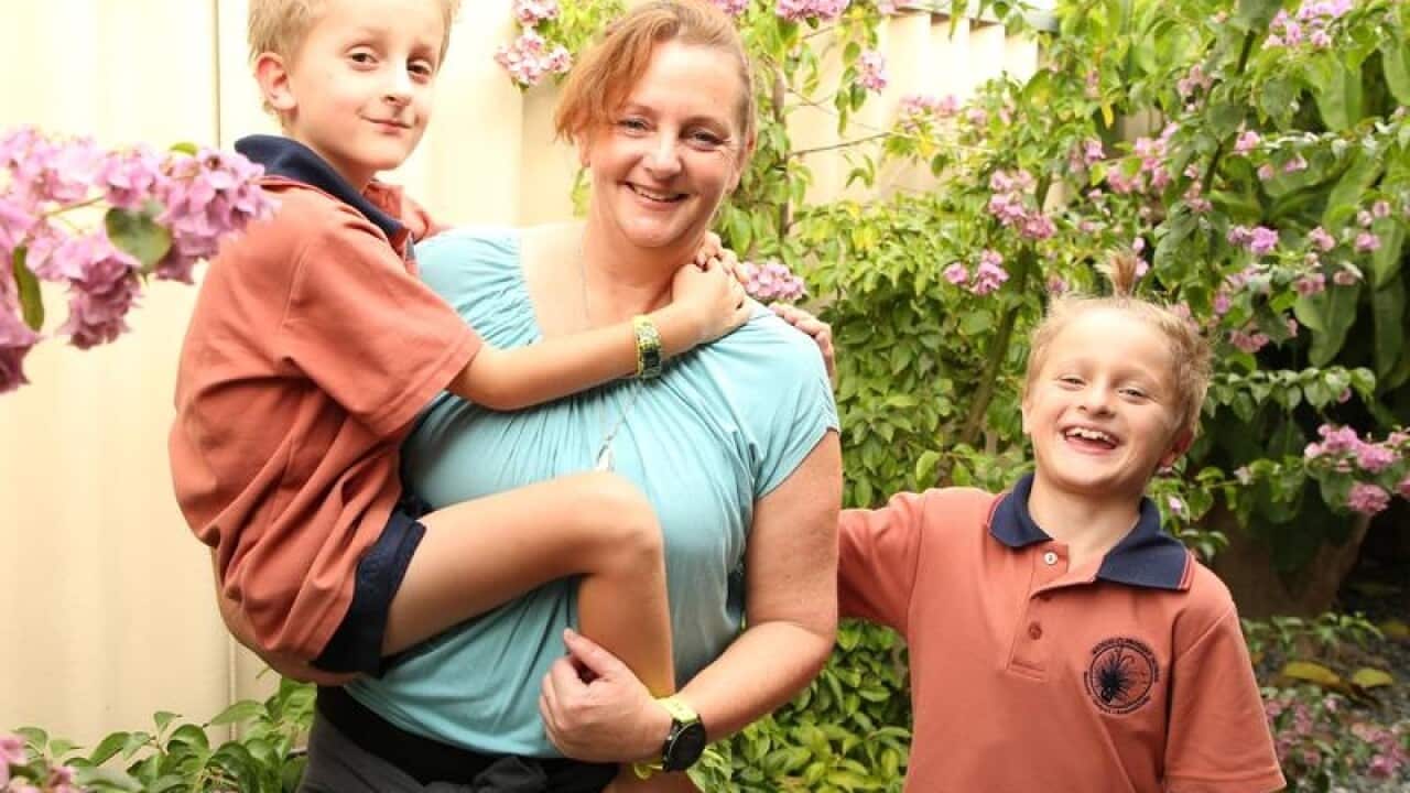 Kate Harper with her twin eight-year-old sons