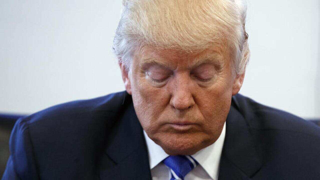 Republican presidential candidate Donald Trump pauses during a meeting with members of the National Border Patrol Council at Trump Tower, Friday, Oct. 7, 2016, in New York. (AP Photo/ Evan Vucci)