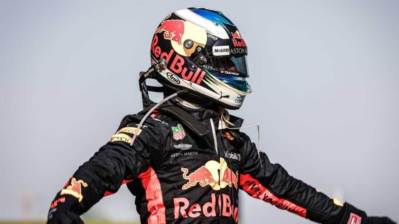 Australia's Daniel Ricciardo celebrates his Chinese GrandPrix win.