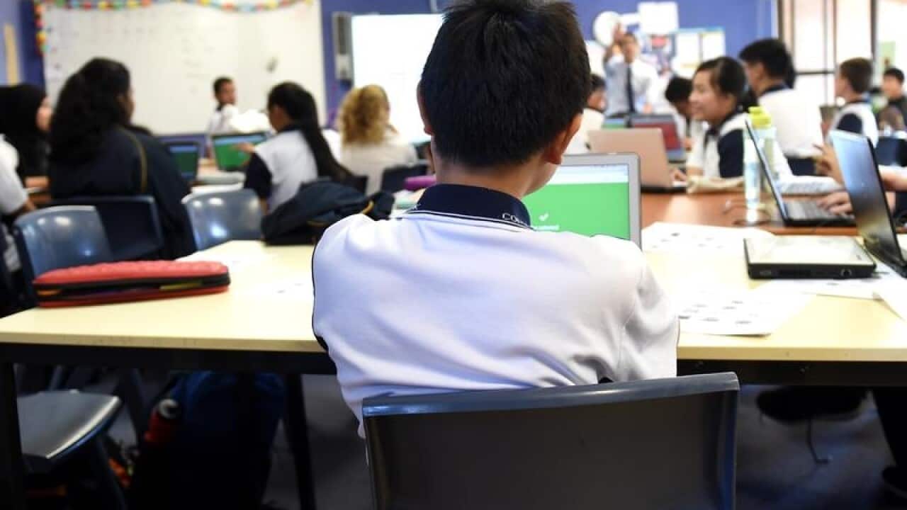 Students attend a class at Alexandria Park Community School.