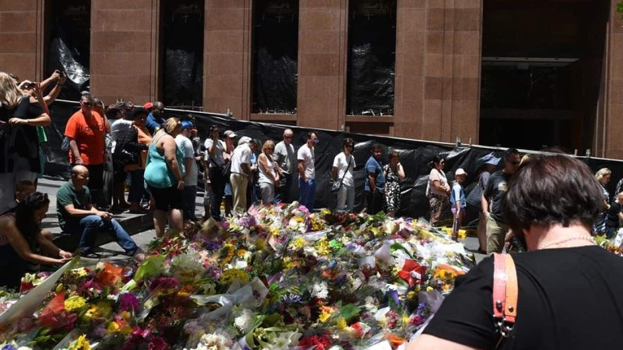 Crowds and flowers outside Sydney's Lindt cafe