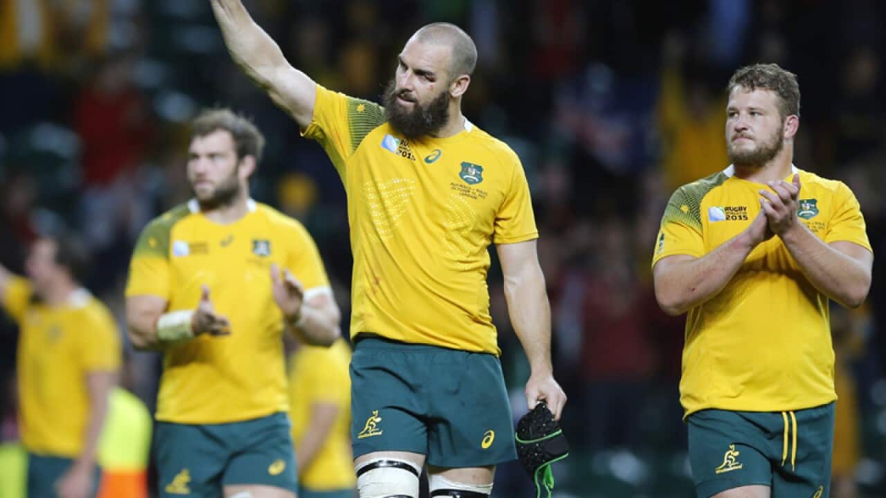 Australia players gesture the crowd at Twickenham