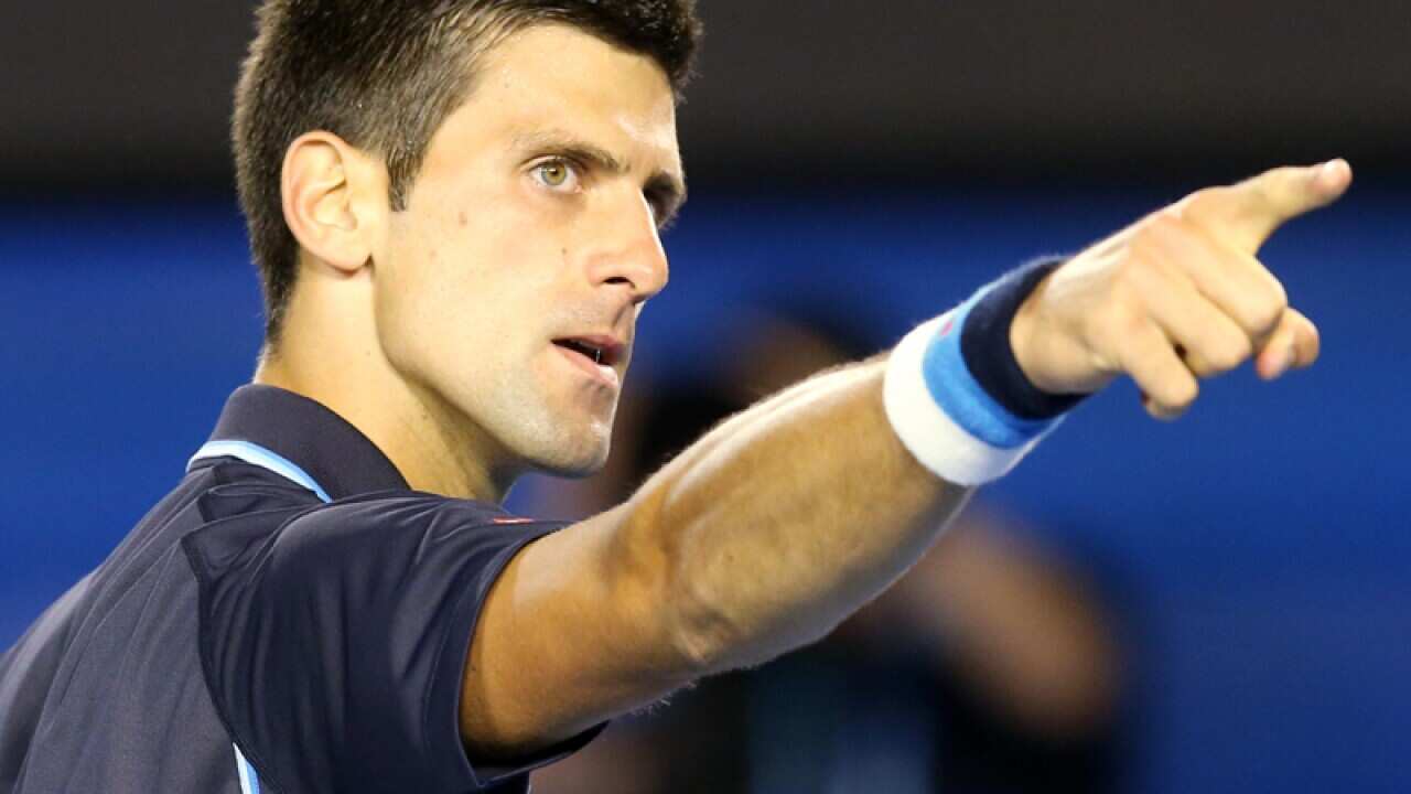 Novak Djokovic of Serbia celebrates his win against Fernando Verdasco