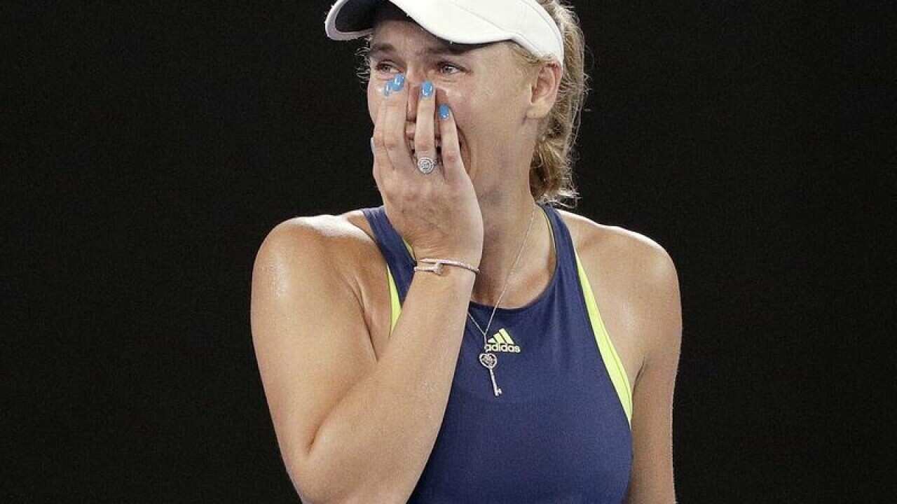 Denmark's Caroline Wozniacki reacts