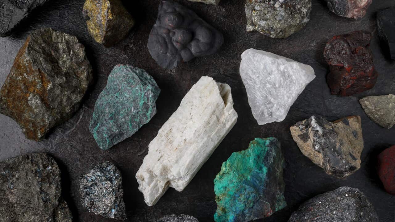 Mixture of critical minerals (United States of America definition), or critical raw materials (European Union definition). Flatlay on slate background