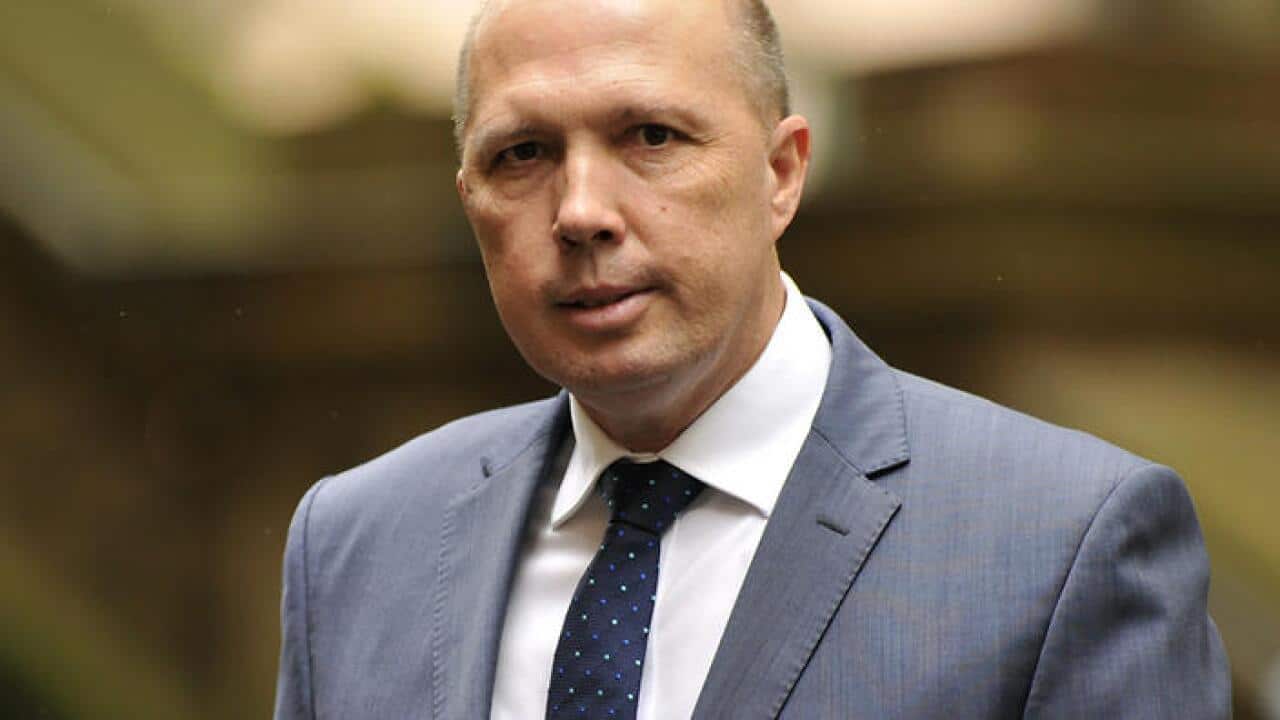 Australian Immigration Minister Peter Dutton arrives at the memorial service for Bill Leak, at Town Hall in Sydney