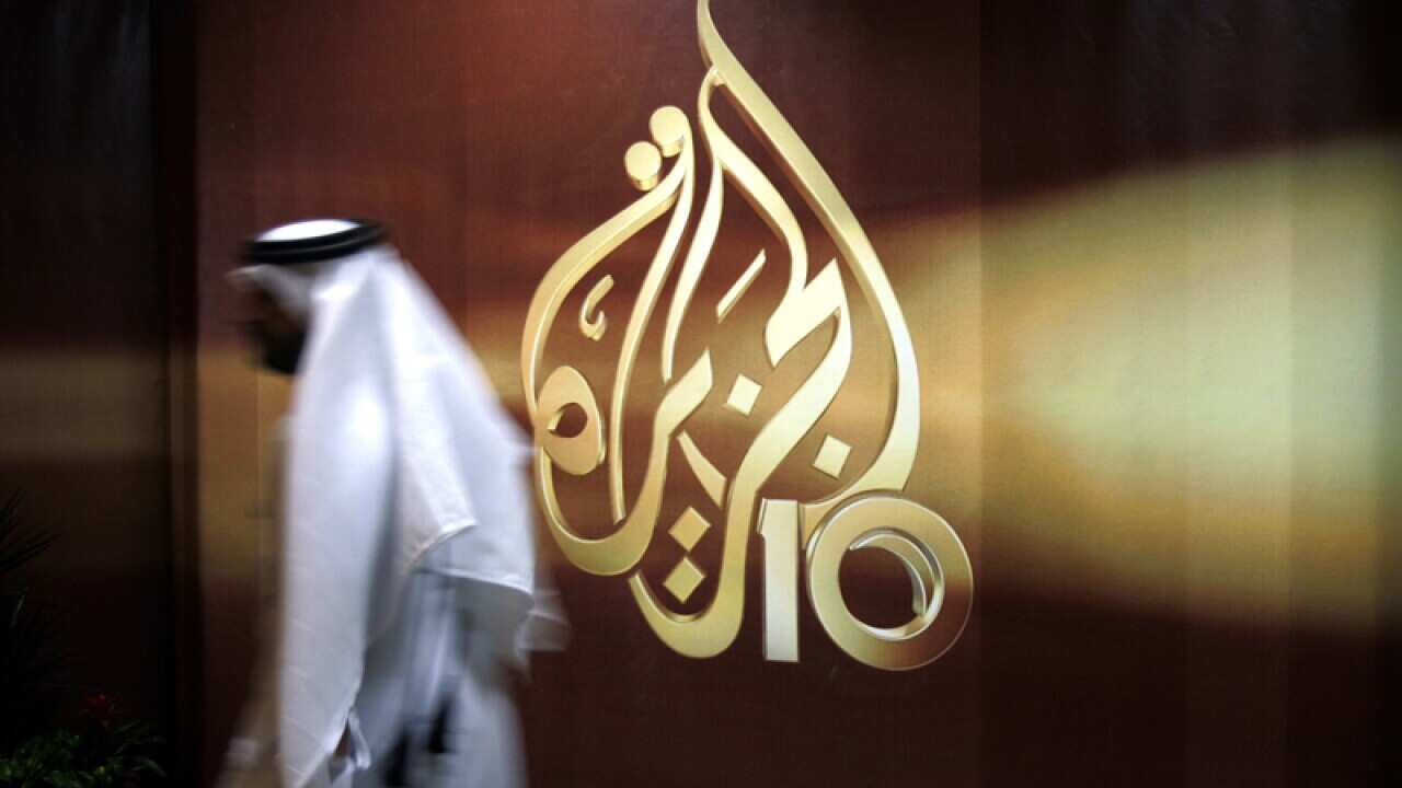 a Qatari employee of Al Jazeera Arabic language TV news channel