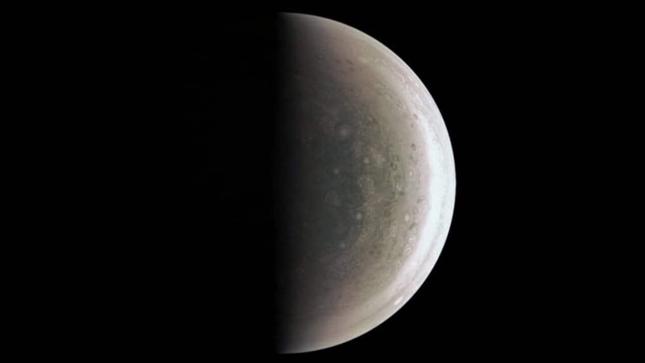 Juno took this picture as it flew over the north pole, from a distance of 195,000km