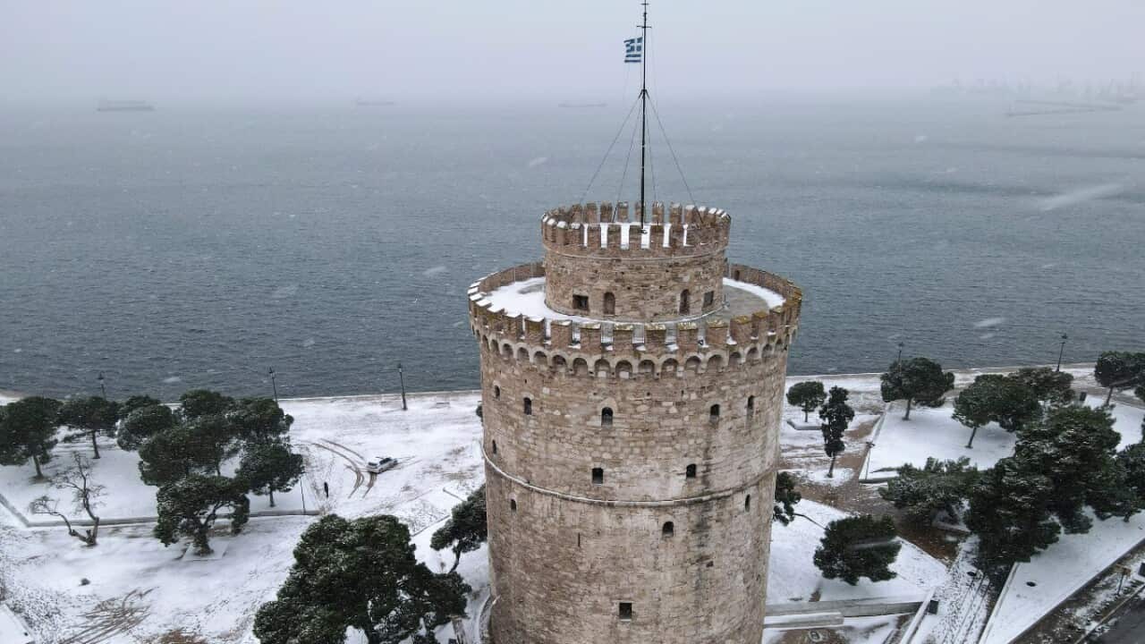 A view of the White Tower covered with snow at the northern city of Thessaloniki, Greece, Sunday, Feb. 14, 2021.