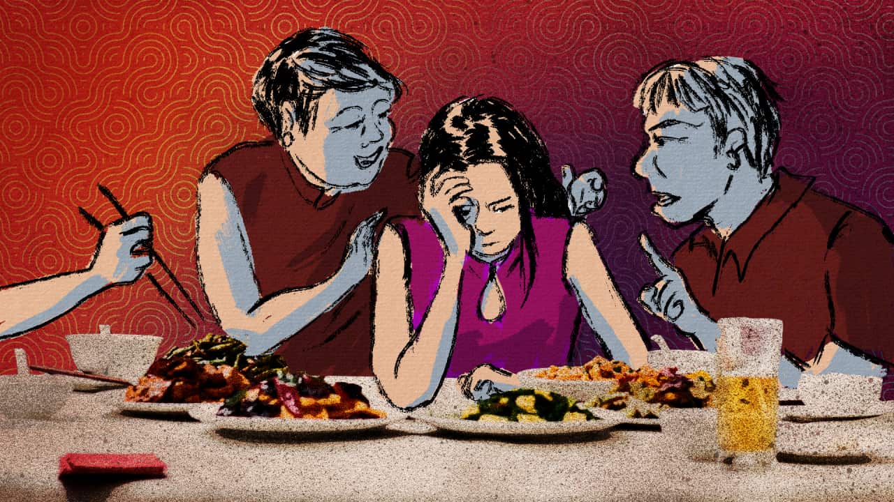 An illustration of a frustrated woman in between senior relatives during a Lunar New Year dinner