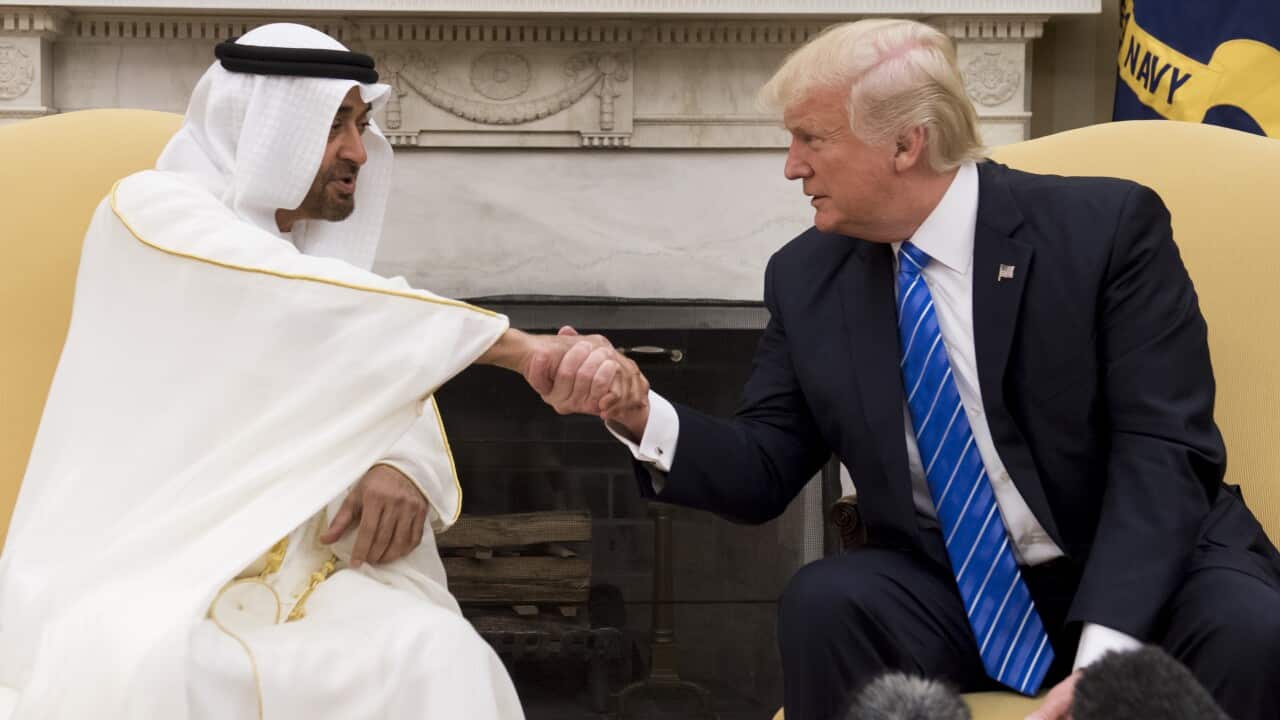 US President Donald Trump shakes hands with Crown Prince Mohammed Bin Zayed Al Nahyan of Abu Dhabi during a meeting in the Oval Office of the White House in Washington, DC, May 15, 2017. / AFP PHOTO / SAUL LOEB        (Photo credit should read SAUL LOEB/A