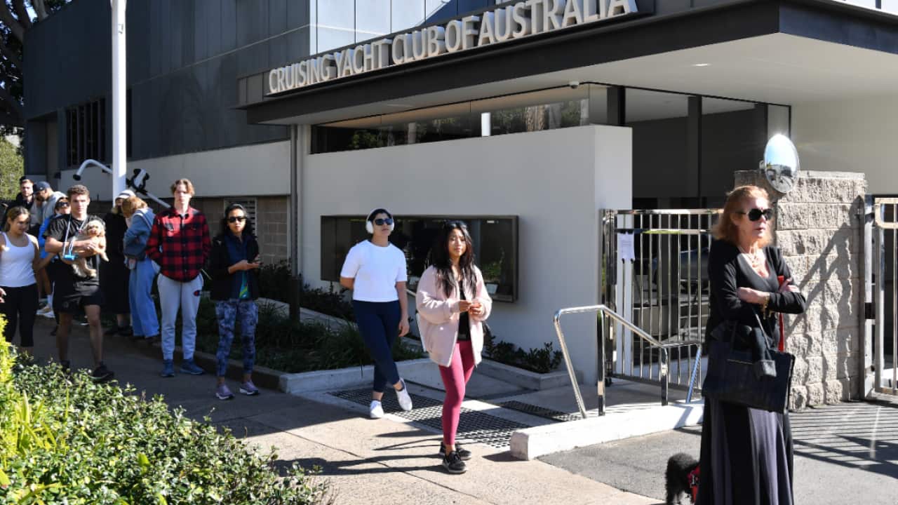 Residents and visitors to Sydney's eastern suburbs line up for COVID-19 testing at a pop-up clinic at Rushcutters Bay in Sydney, Wednesday, July 29, 202