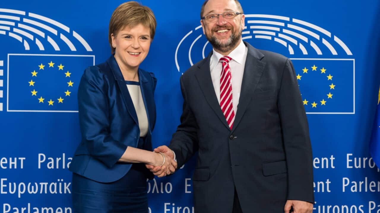 Martin Schultz, right, greets Scottish First Minister Nicola Sturgeon