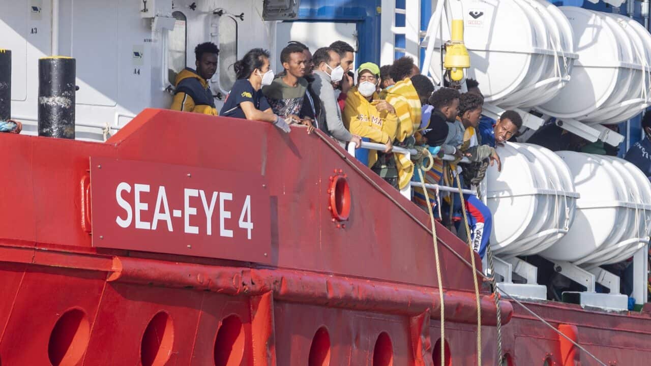 The Sea Eye 4 ship carrying 800 migrants rescued in various rescue operations in the Mediterranean sea, docks in the port of Trapani, southern Italy.