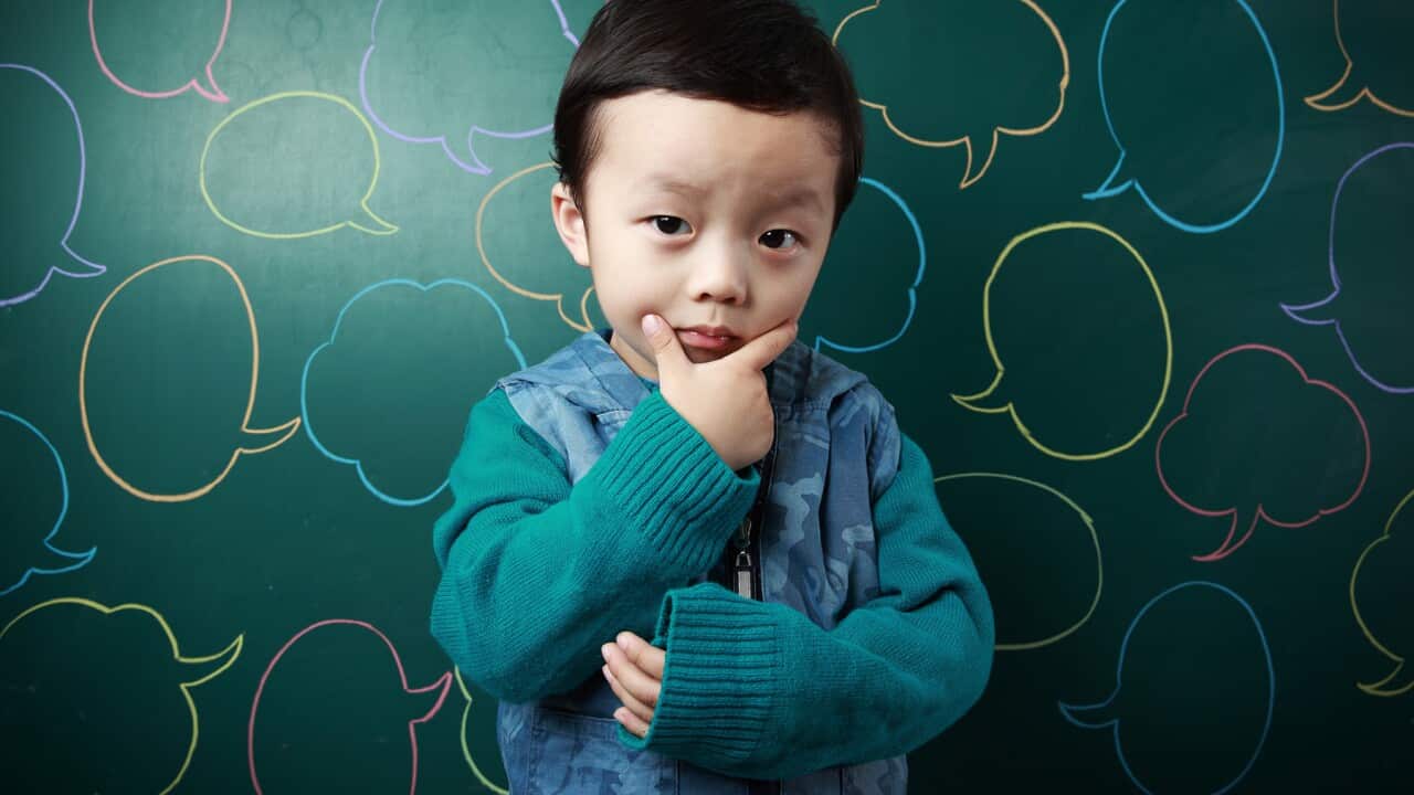 Young child looking curious