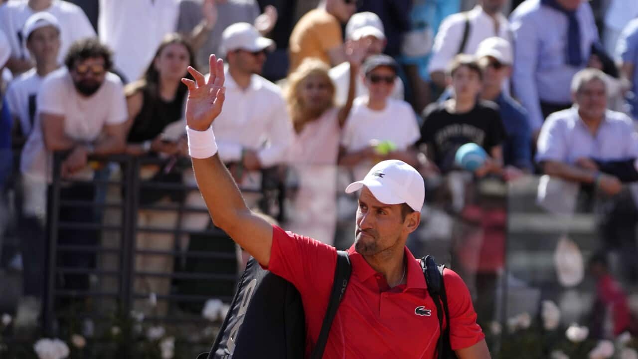 Serbia's Novak Djokovic waves to the crowd after losing the match against Chile's Alejandro Tabilo at the Italian Open tennis tournament in Rome