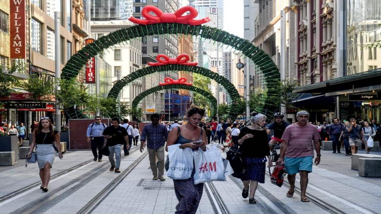 A stock image of people walking through George st mall.