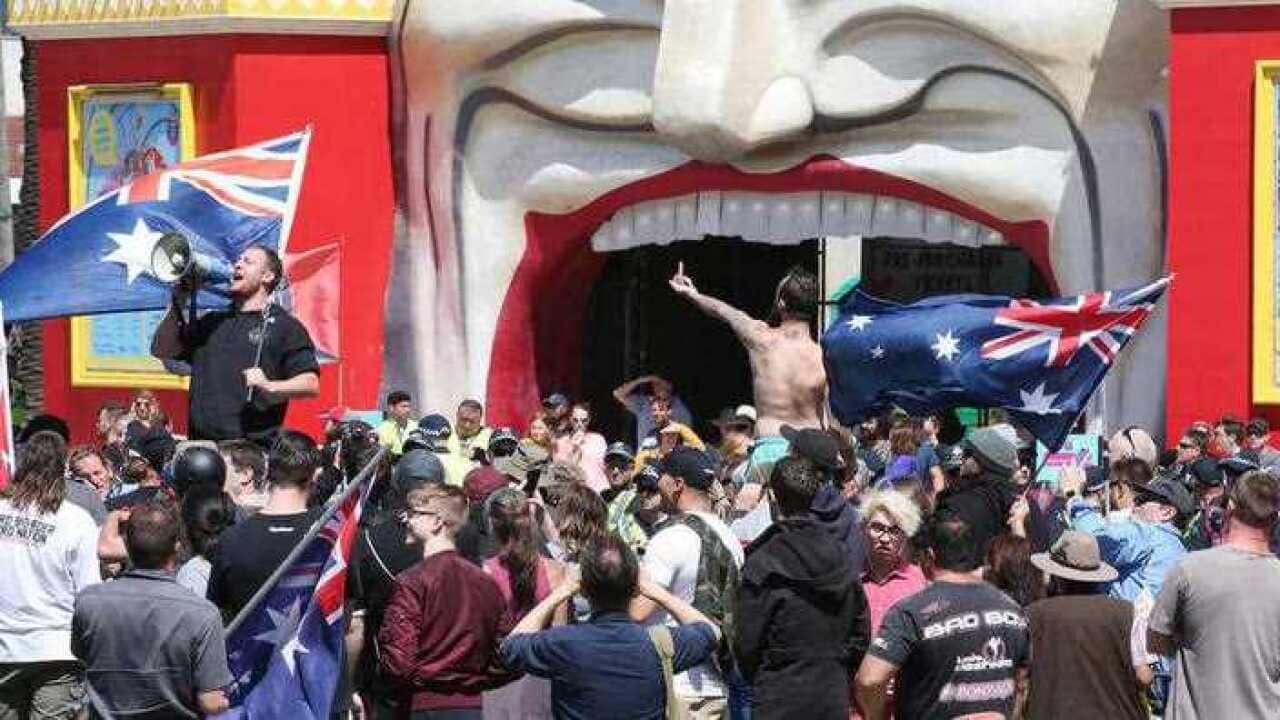 Far-right activists protest in front of Luna park in St Kilda on Saturday, January 5 2019.