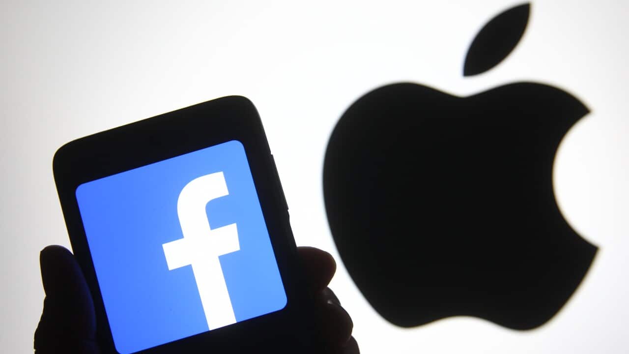 In this photo illustration, the Facebook logo seen displayed on a smartphone in front of an Apple logo. (Photo by Pavlo Gonchar / SOPA Images/Sipa USA)