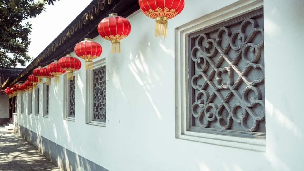 chinese red lanterns hanging on wall