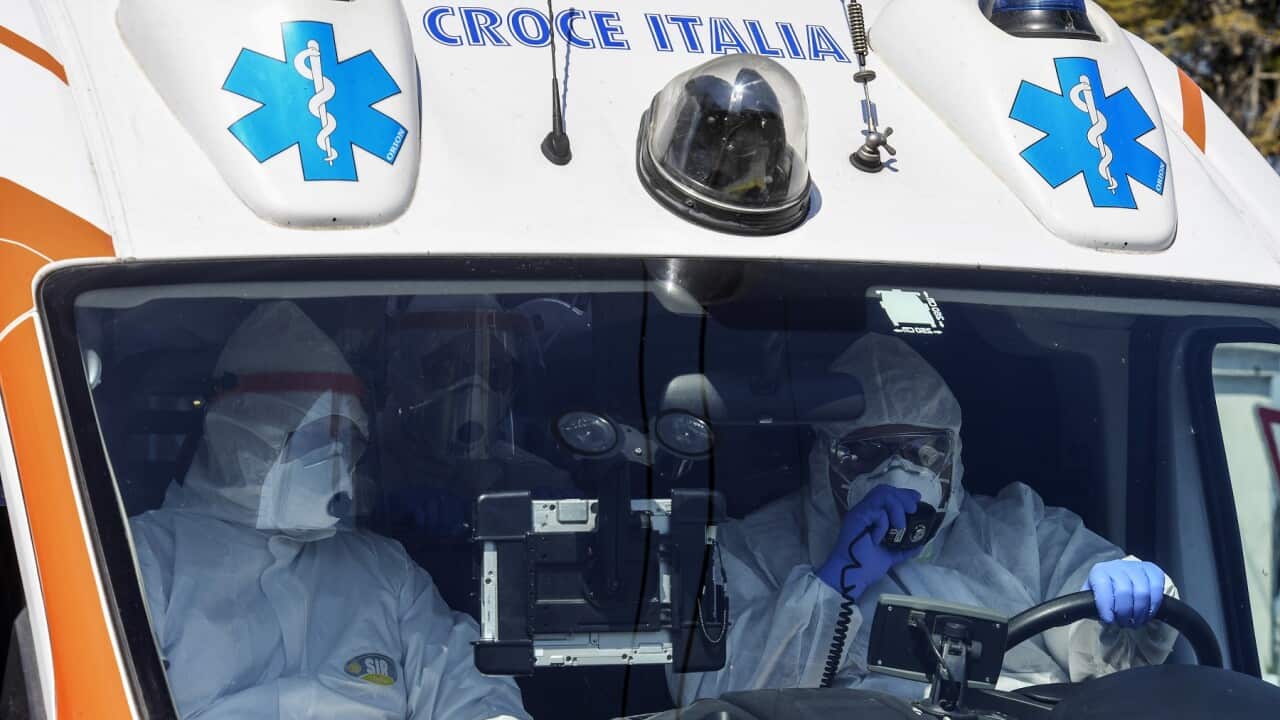Paramedics on board the high bio-containment ambulance on their way to the emergency room of the Cotugno hospital in Naples
