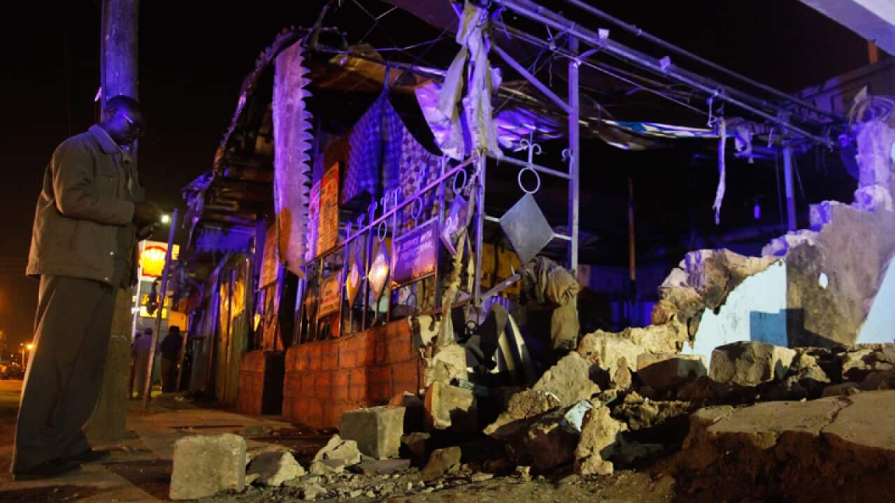 Security officers at the scene of a bomb attack