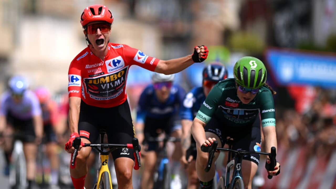 Marianne Vos (Jumbo-Visma) celebrates winning Stage 3 of La Vuelta Femenina ahead of Charlotte Kool (Team DSM)