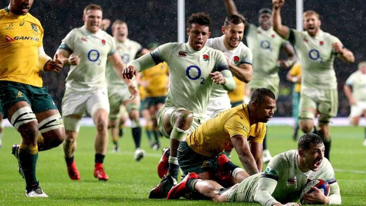 Jonny May scores for England.