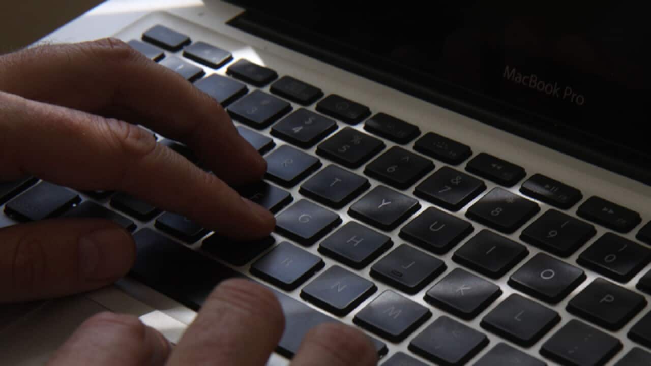 A man using a laptop